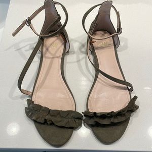 Olive green sandals.